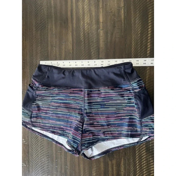 Athleta woman's running shorts size Small Navy blue with multi-color stripes - Picture 3 of 6